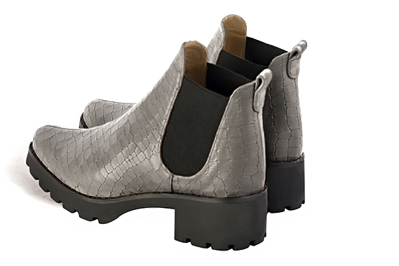 Ash grey and matt black women's ankle boots, with elastics. Round toe. Low rubber soles. Rear view - Florence KOOIJMAN